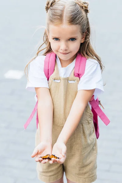 Adorable Little Child Backpack Holding Butterfly Hands — Stock Photo, Image