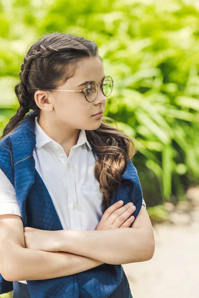 Serious Schoolgirl Crossed Arms White Shirt Jumper Shoulders Looking Away — Stock Photo, Image