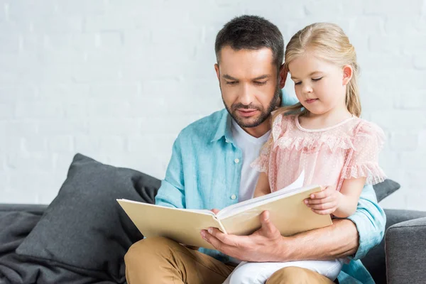 Father Adorable Little Daughter Reading Book Together Home — Stock Photo, Image