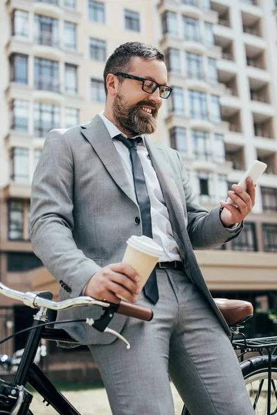 Bearded Businessman Disposable Cup Coffee Smartphone Leaning Bike — Stock Photo, Image