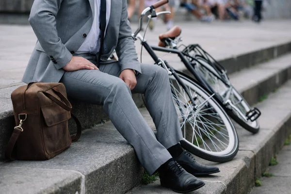 Cropped View Businessman Grey Suit Sitting Stairs Bike — Stock Photo, Image