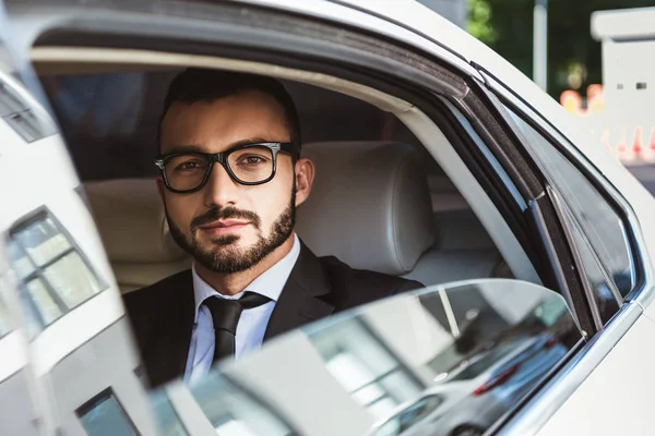 Handsome Businessman Sitting Car Looking Camera — Free Stock Photo