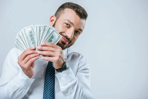 Lächelnder Finanzier Zeigt Dollars Isoliert Auf Grau — Stockfoto