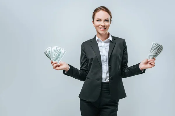 Attractive Financier Holding Dollars Hands Looking Camera Isolated Grey — Stock Photo, Image