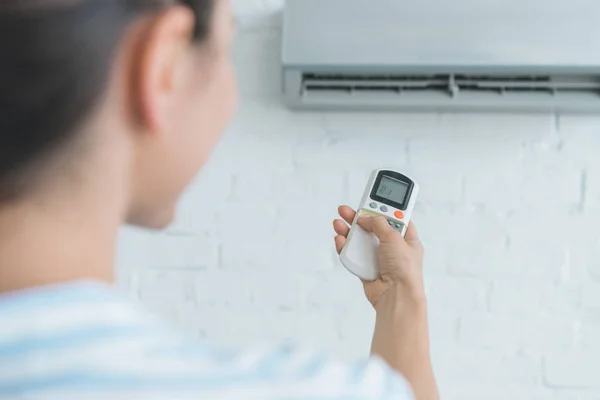 Selective Focus Woman Remote Control Turning Air Conditioner — Stock Photo, Image