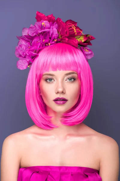 Close-up portrait of beautiful young woman with pink bob cut and flowers in hair looking at camera isolated on violet — Stock Image Close Portrait Beautiful Young Woman Pink Bob Cut Flowers Hair Royalty Free Stock Images