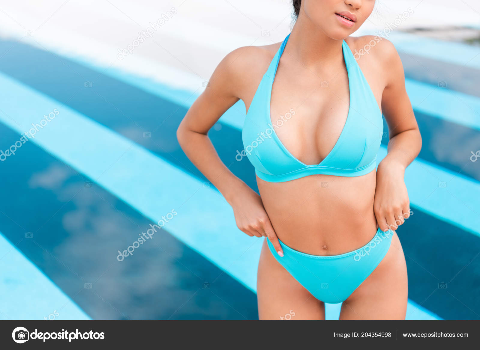 girl in blue swimsuit