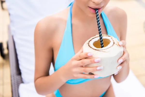 Cropped View Girl Drinking Coconut Cocktail Straw — Free Stock Photo
