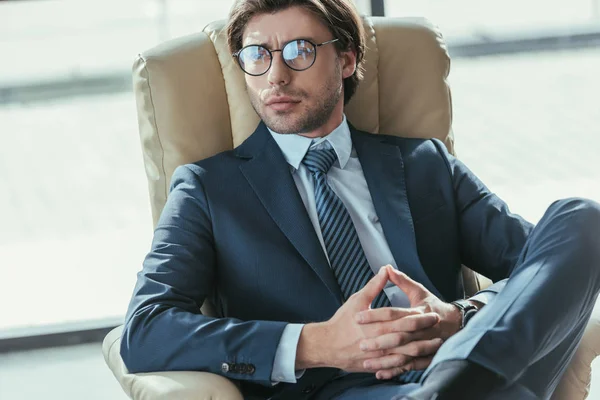 Handsome Thoughtful Businessman Sitting Armchair Looking Away Modern Office — Stock Photo, Image