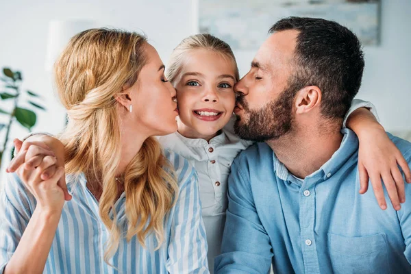 Happy Young Parents Kissing Daughter Sides — Stock Photo, Image
