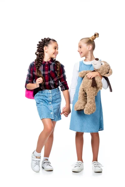 Schoolchildren Holding Hands Looking Each Other Isolated White — Stock Photo, Image
