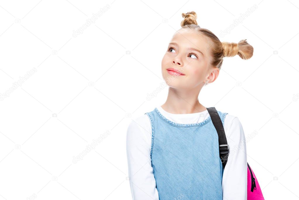 portrait of cheerful schoolchild looking up isolated on white