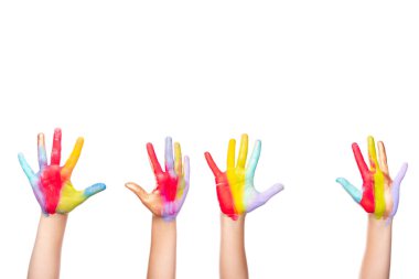 cropped image of schoolchildren showing painted colorful hands isolated on white clipart