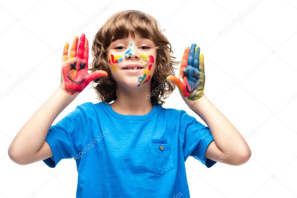 funny schoolboy showing painted hands with smiley icons isolated on white
