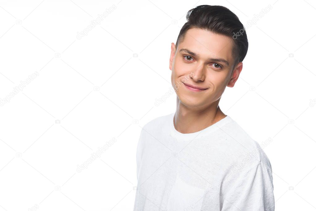 portrait of handsome man in white shirt looking at camera isolated on white