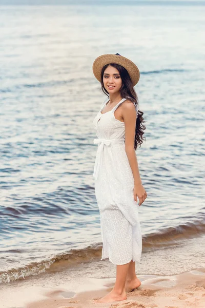 Beautiful Young Woman Straw Hat White Dress Walking Sea Shore — Stock Photo, Image
