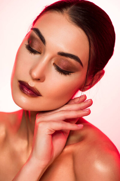 portrait of attractive tender girl with closed eyes, red toned picture