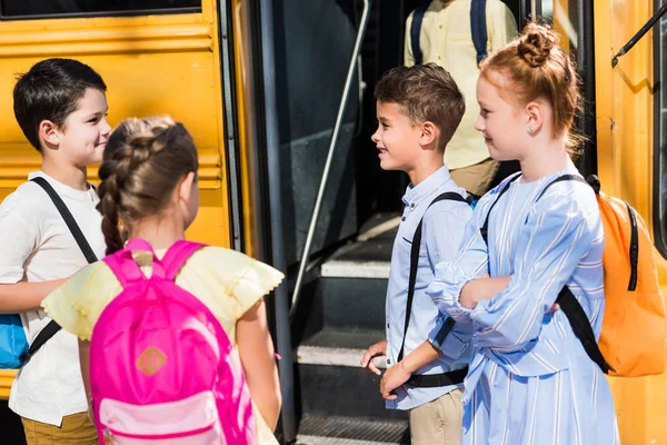 Group Happy Schoolchildren Chatting School Bus — Free Stock Photo