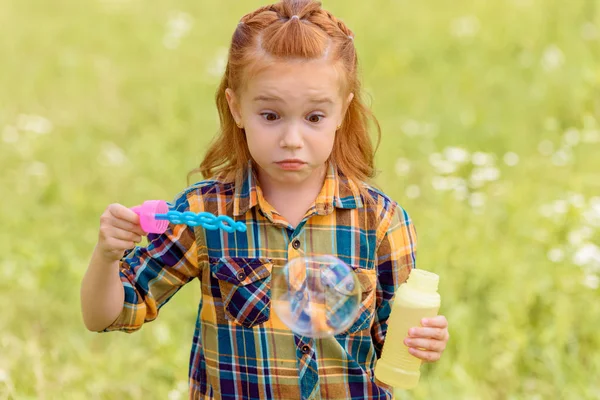 Portrait Shocked Kid Blowing Soap Bubbles Meadow — Stock Photo, Image