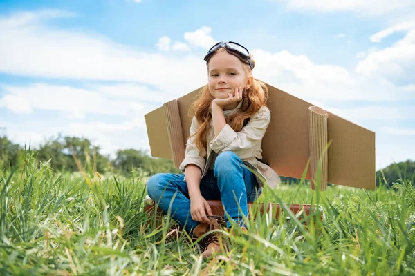 Adorable Kid Pilot Costume Sitting Retro Suitcase Summer Field Blue — Stock Photo, Image