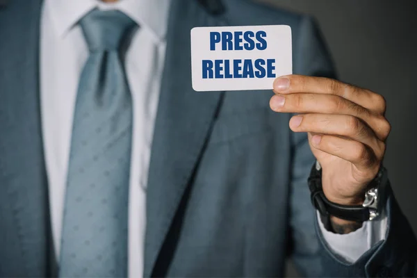 Partial View Businessman Showing Card Press Release — Stock Photo, Image