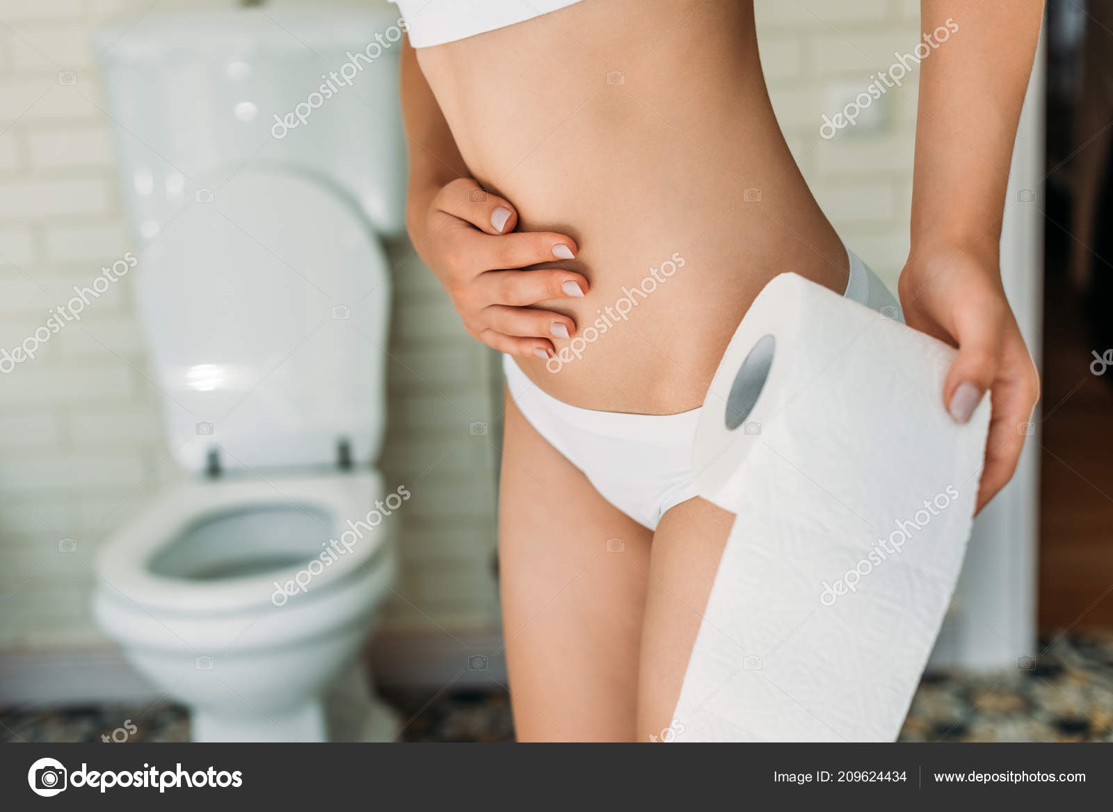 Cropped Shot Girl White Underwear Holding Toilet Paper While Suffering  Stock Photo by ©AllaSerebrina 209624434