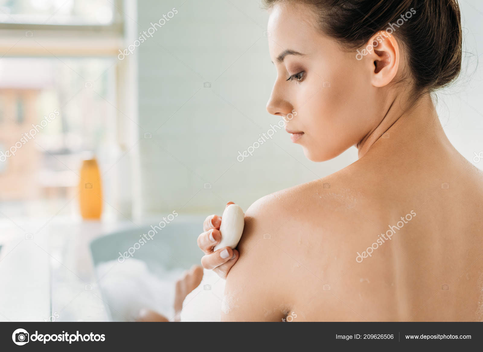 naked girl takeing a bath