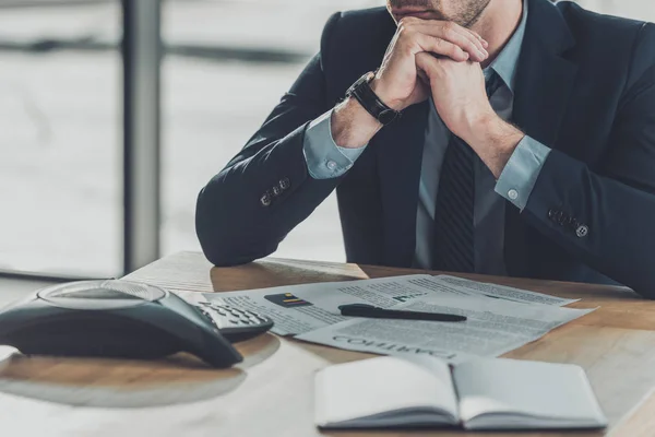 Cropped Shot Thoughtful Young Businessman Sitting Workplace Paperwork Speakerphone — Stock Photo, Image