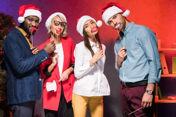 Multicultural Businesspeople Holding Lips Mustaches Sticks New Year Corporate Party — Stock Photo, Image