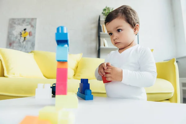 Adorable Boy Playing Colorful Constructor Blocks Home — Free Stock Photo
