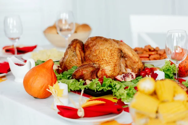 selective  focus of baked turkey on served table for thanksgiving dinner