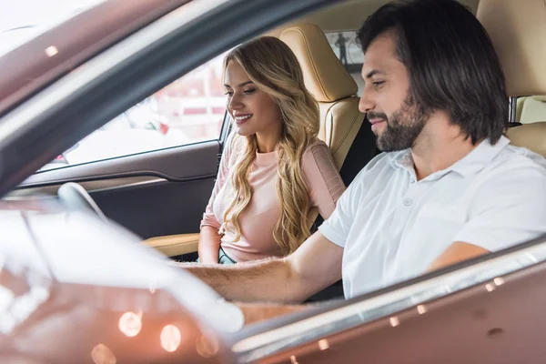 Young Couple Sitting New Car Test Drive Dealership Salon — Stock Photo, Image