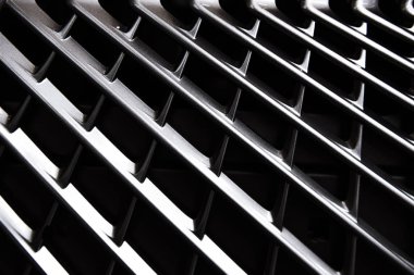 full frame of car metal grating as background clipart