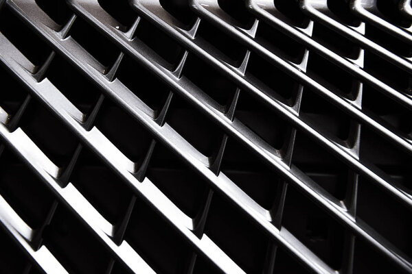 full frame of car metal grating as background