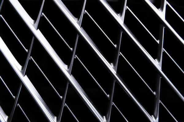 full frame of car metal grating as background