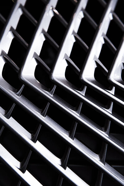 full frame of car metal grating as background
