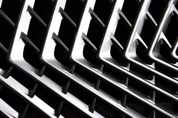 full frame of car metal grating as background