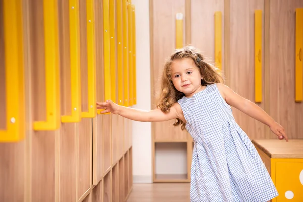 Adorable Kid Standing Kindergarten Cloakroom Taking Locker Handle — Stock Photo, Image