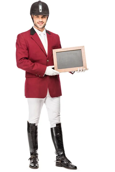 Sorridente Jovem Cavaleiro Uniforme Segurando Quadro Branco Olhando Para Câmera — Fotografia de Stock Grátis