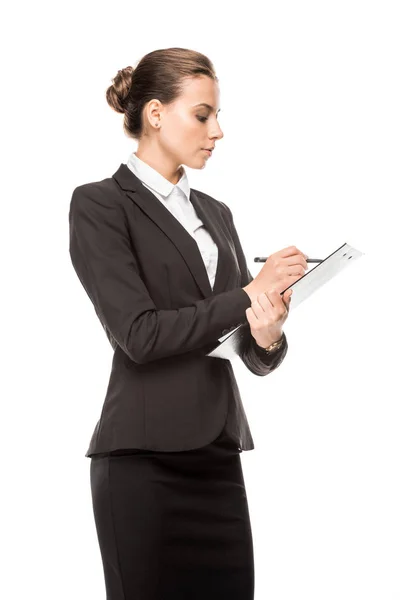Side View Beautiful Young Businesswoman Writing Clipboard Isolated White — Stock Photo, Image