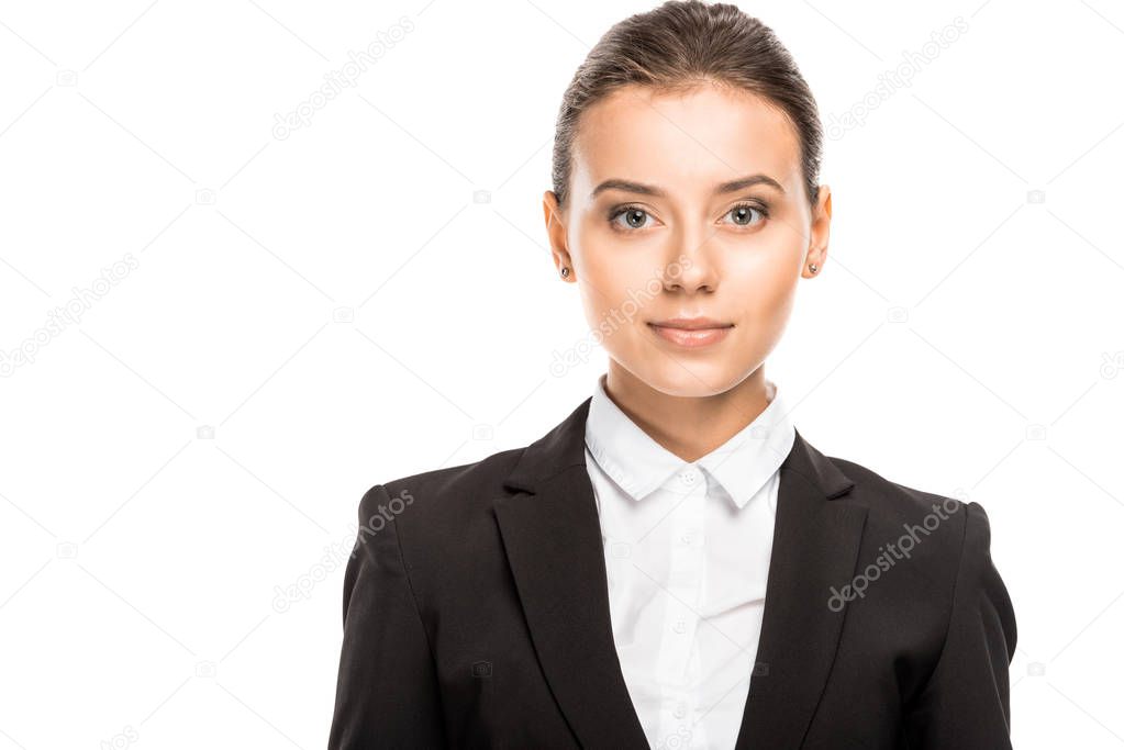 close-up portrait of attractive young businesswoman in suit looking at camera isolated on white