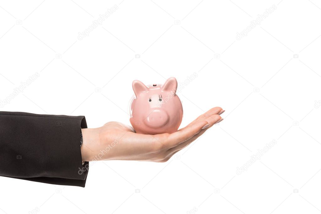 cropped shot of businesswoman holding piggy bank isolated on white