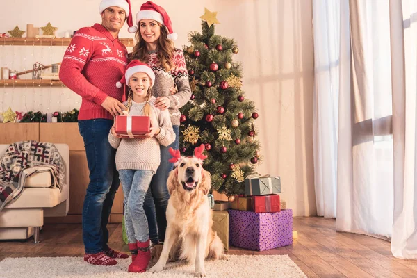 Family Daughter Santa Hats Dog Deer Horns Posing Christmas Tree — Stock Photo, Image