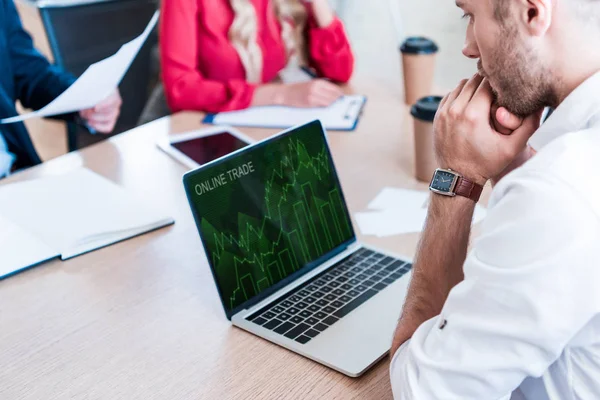 Partial View Pensive Businessman Looking Laptop Screen Online Trade Lettering — Stock Photo, Image