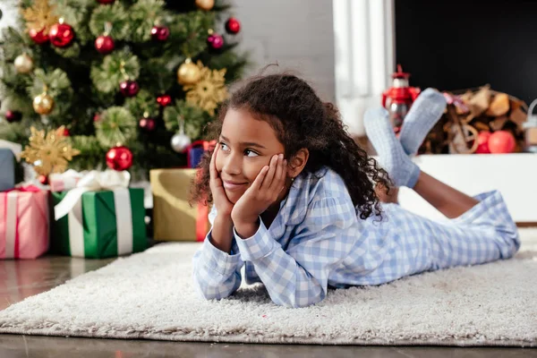 Adorable African American Child Pajamas Lying Floor Looking Away Home — Stock Photo, Image