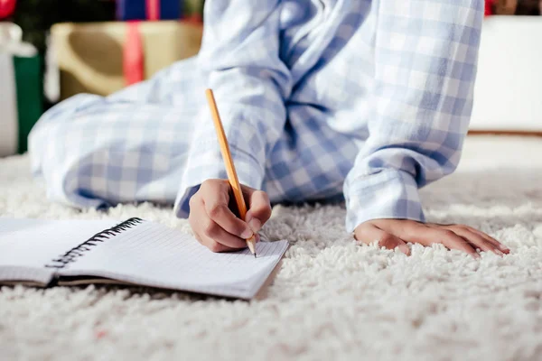 Cropped Image African American Child Pajamas Writing Something Notebook Pencil — Stock Photo, Image