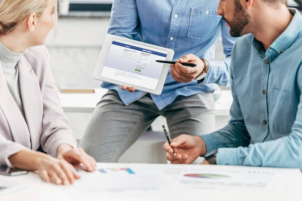 Cropped Shot Businessman Showing Digital Tablet Facebook Website Colleagues Workplace — Stock Photo, Image