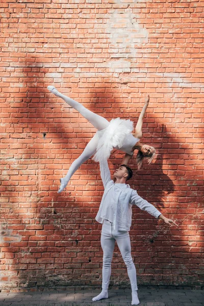 Young Couple Dancers Performing Ballet Dance Brick Wall — Free Stock Photo