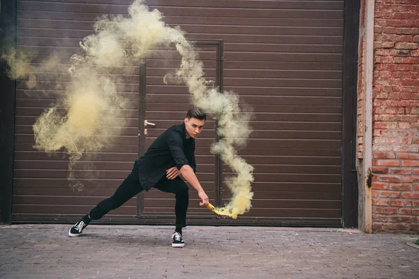 Young Man Dancing Yellow Smoke City Street — Stock Photo, Image