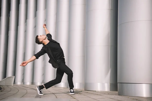 Young Man Black Clothes Dancing Columns Street — Stock Photo, Image